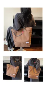 Casual nylon tote bag with climbing rope handles, waterproof, durable, large capacity.