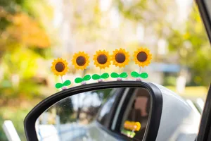 Cute shaking sunflower car rearview mirror decoration for cute auto interior dashboard styling.