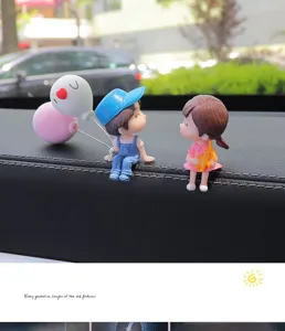 Cute couple dashboard figurine for car interior, adorable resin cartoon ornament gift.