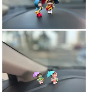 Cute cartoon umbrella girl car dashboard ornament, healing resin interior decorative figurine.