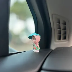 Cute cartoon umbrella girl car ornament, sweet healing character dashboard decoration item.