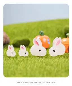 Mini luminous resin rabbit figurines for car dashboard and cute micro landscape decoration.