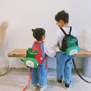 Cute cartoon dinosaur detail on toddler backpack, ideal for kids daily use and outdoor.