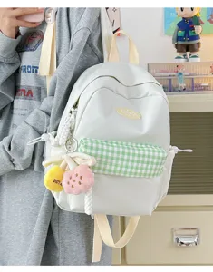 Ins style mini backpack for women, cute white school bag with green plaid pocket and plush.
