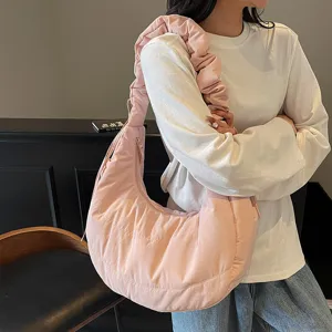 Pink nylon cloud shoulder bag for women, casual slouchy dumpling tote and crossbody purse.