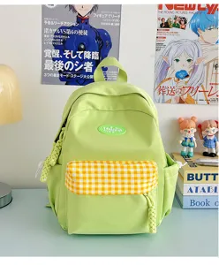Chic green mini backpack for women and teens, cute canvas casual daypack for daily school use.