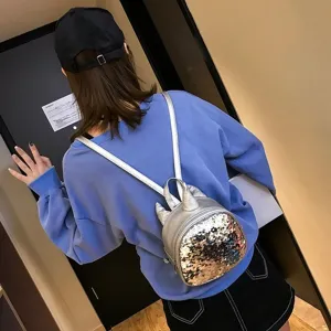Kids sequin mini backpack with unicorn horn design, colorful sparkling small bag for children.