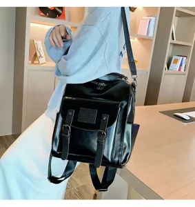 Women PU leather retro backpack large capacity casual shoulder bag convertible handbag.