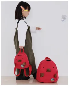 Red corduroy mini backpack featuring cute cartoon animal design, perfect for daily casual use.