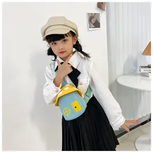 Kids cartoon mushroom crossbody bag detail, cute blue yellow canvas shoulder bag for girls.