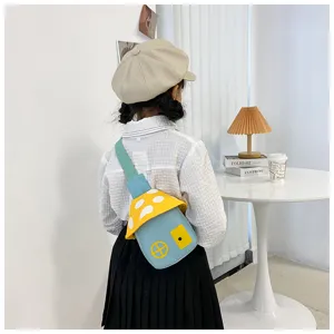 Cute mushroom house shape crossbody bag for kids, vibrant color contrast design, stylish detail.