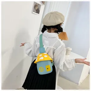 Cute mushroom shaped kids crossbody bag detail view showing unique cartoon design and strap.