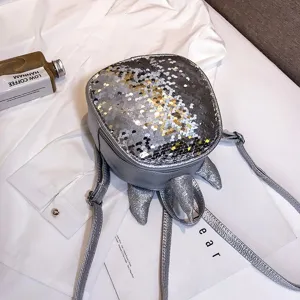 Close-up view of the silver sequin mini unicorn backpack showcasing sparkling details.