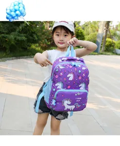 Cute purple unicorn kids backpack detail, featuring adorable cartoon prints and front pocket.