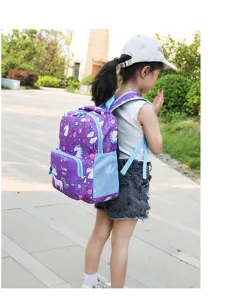 Cute unicorn kids backpack for kindergarten boys and girls, purple school bag with side pockets.