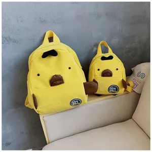Cute yellow duckling backpack detail view, featuring soft corduroy fabric and playful animal styling.