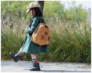 Japanese style cute corduroy mini backpack with quirky cartoon animal design for school kids.
