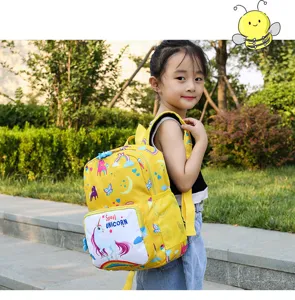 Cute cartoon unicorn kids backpack for kindergarten boys and girls, bright yellow school bag.