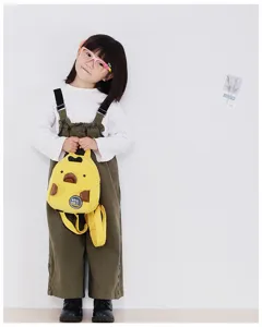 Cute yellow corduroy mini backpack detail, cartoon animal design with cute face patch.