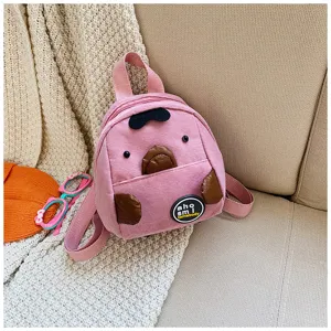 Cute mini pink corduroy backpack for kids, casual small daypack with adorable cartoon animal design.