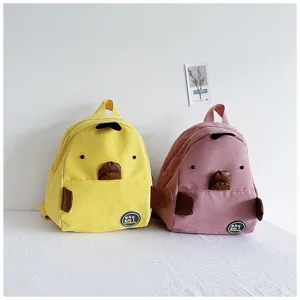 Cute cartoon chick mini corduroy backpack detail view, lovely animal design, soft fabric.
