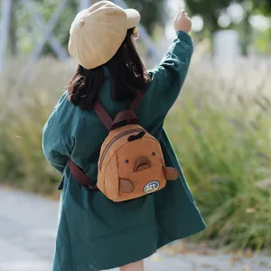 Cute mini corduroy backpack for kids, stylish cartoon animal design for daily casual use.