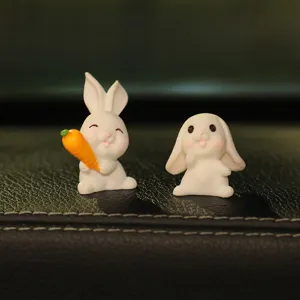 Cute resin rabbit car ornaments set, mini bunny dashboard figurines for interior decoration.