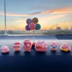 Adorable ensemble de décoration de tableau de bord de voiture avec cochon rose et et arbre à ballons.