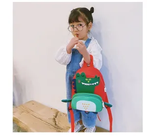 Cute cartoon dinosaur children backpack for kindergarten boys and girls, stylish design.