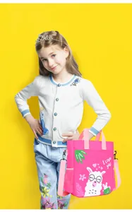 Detailed scene view of the cute pink canvas tote bag featuring an adorable alpaca cartoon print.