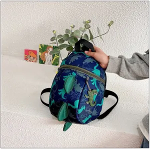 Cute dinosaur children backpack detail showing 3D spine design, perfect for kindergarten kids.