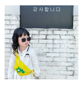 Kids yellow dinosaur waist bag, trendy children crossbody chest bag for casual daily use.
