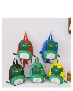 Cute dinosaur kids backpack details showing cute front pocket and colorful animal design.