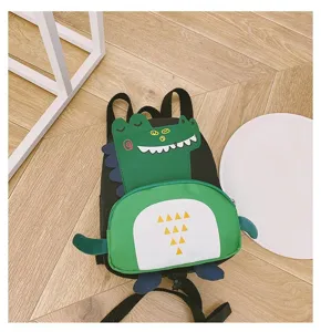 Cute dinosaur cartoon detail view of the children backpack showing the vivid 3D face and teeth.
