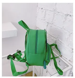 Detailed side view of the cute green dinosaur kids backpack, showing zipper and strap design.