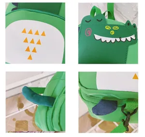 Detailed view of the cute green dinosaur kids backpack, highlighting stitching and design.