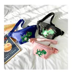 Detail view of cute children waist bags featuring cartoon dinosaur embroidery, trendy casual style.