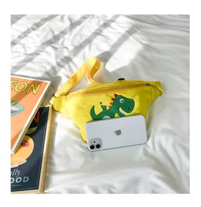Cute yellow kids fanny pack with green dinosaur patch, casual canvas chest bag for kids.