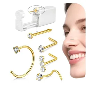 Kit de pistola perforadora de nariz desechable con varios pendientes y aros de cristal dorado.