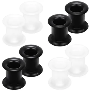 Silicone ear tunnels detail shot showing double flared plugs in black and white colors.