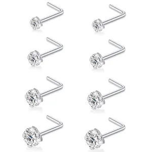 Close-up view showing the detailed sparkle of silver L-shaped nose stud piercing jewelry.