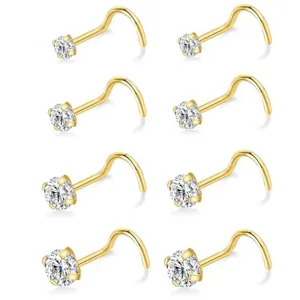 Detailed view of gold-colored sparkling rhinestone L-shaped nose stud piercing jewelry item close up.