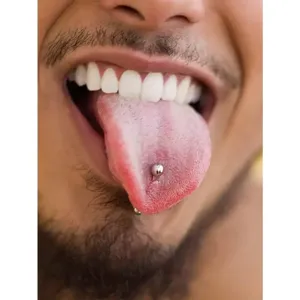 Detailed close-up view of a stylish stainless steel body piercing tongue ring and stud.
