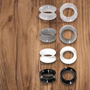 Silicone ear tunnels and plugs set, double flared ear stretching gauges in multiple colors.
