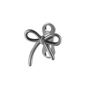 G23 titanium minimalist bow microdermal anchor top detail showing smooth polished metal finish.