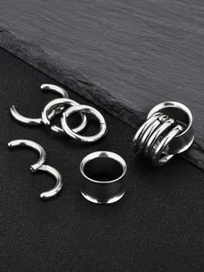 Stainless steel ear tunnel gauges with hanging segment rings body piercing jewelry detail view