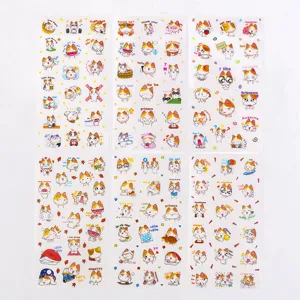 Close up detail of cute cartoon cat stickers with various expressions and phrases for DIY crafts.