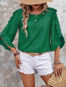 Detailed view of the elegant green ruffled 3/4 sleeve top, perfect for spring and summer.