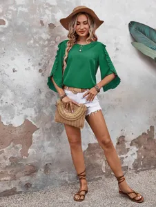 Detailed view of women's round neck ruffled irregular 3/4 sleeve green blouse, casual summer style.