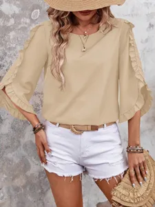 Detailed view of the elegant beige ruffle sleeve blouse with a classic round neckline.
